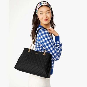 Kate Spade Black and Gold Shoulder Bag with Structured Design